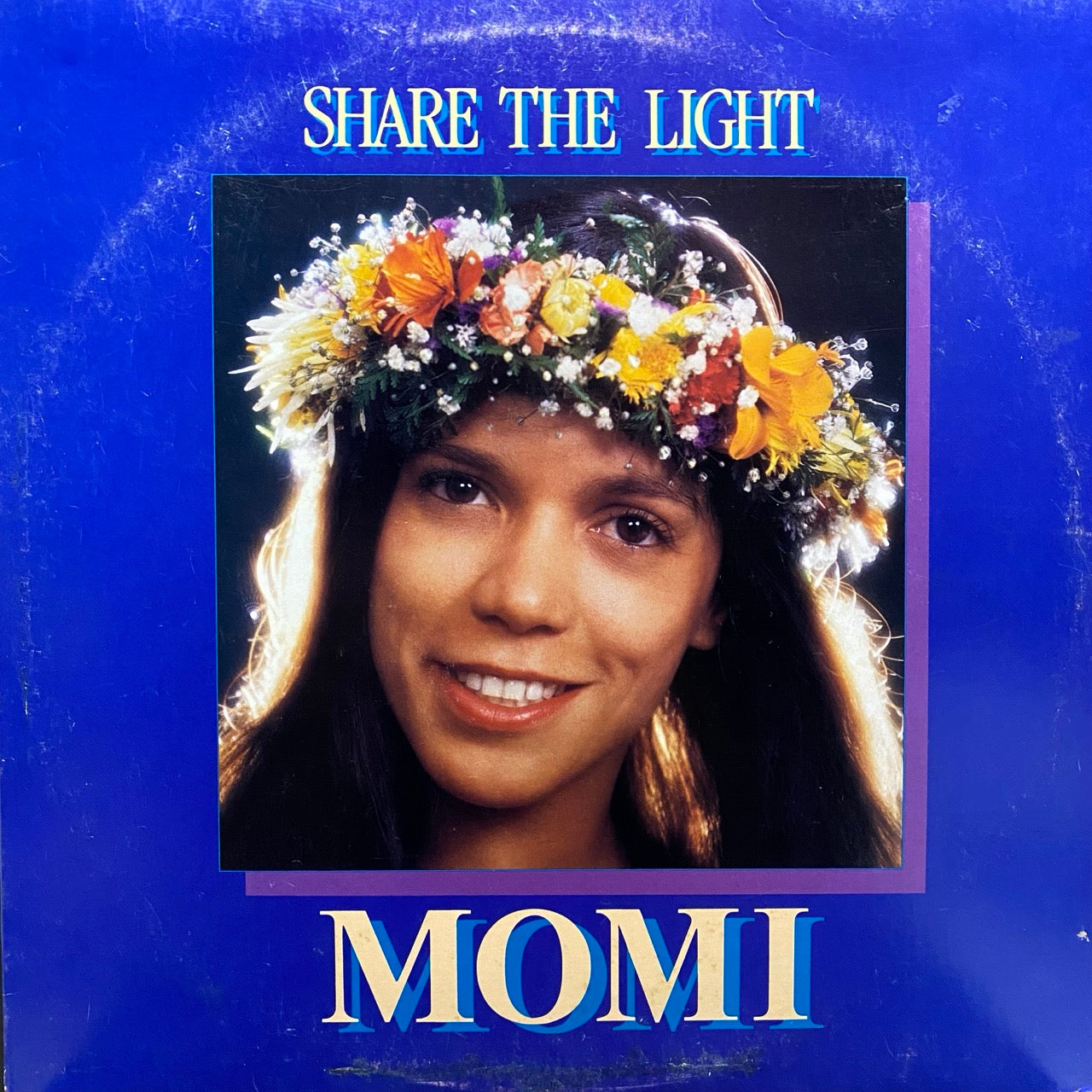 Momi – Share The Light