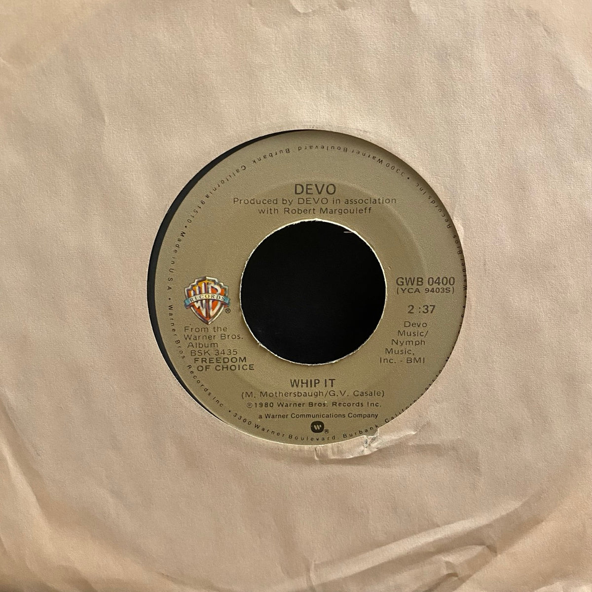 Devo – Whip It / Girl U Want [7"]