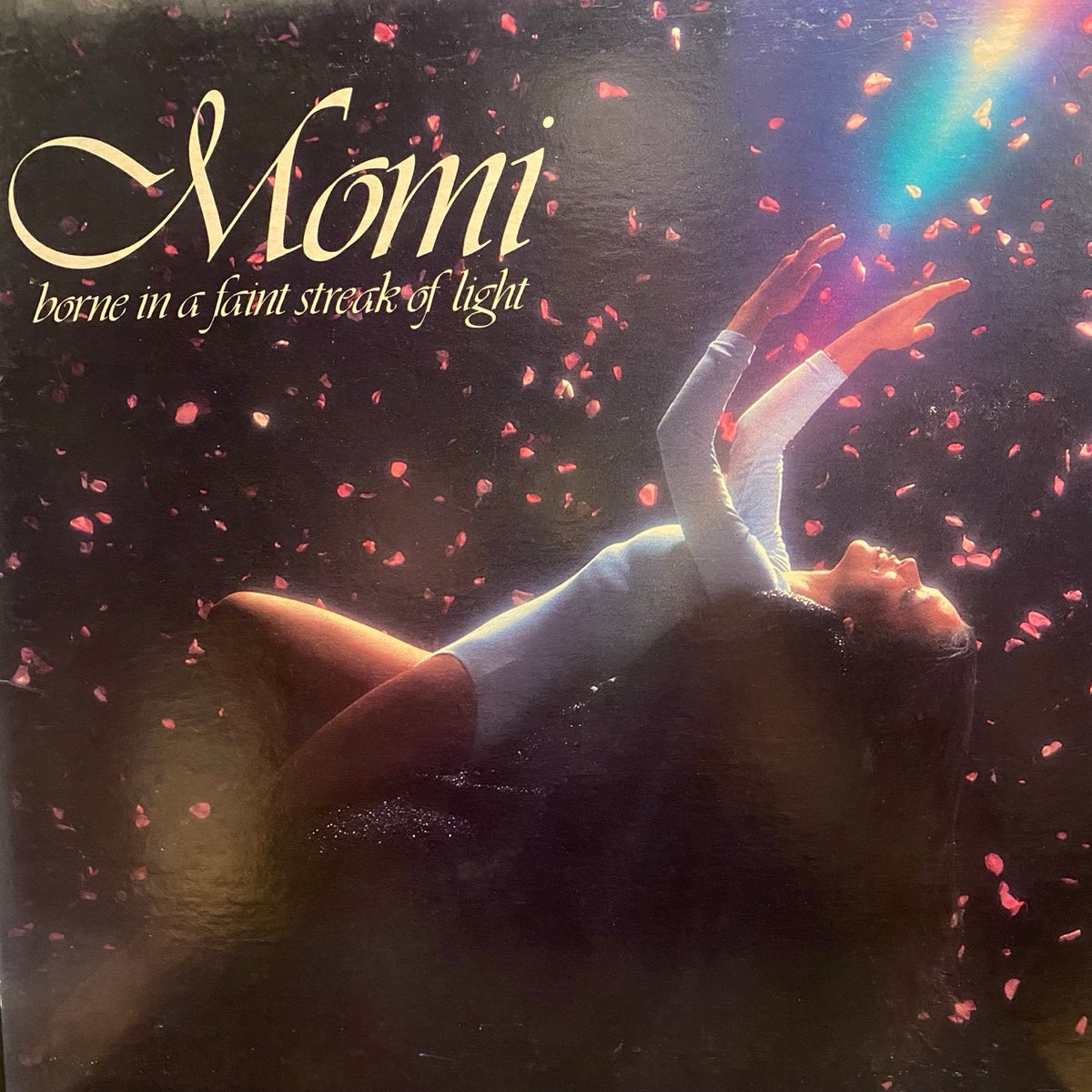 Momi – Borne In A Faint Streak Of Light